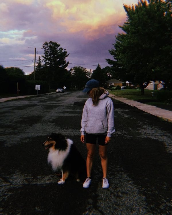 Liliane Blanco Binette posing with her pet dog