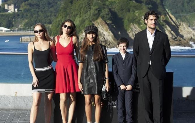 Lily-Rose Depp (left) with the cast of the film A Faithful Man for an event