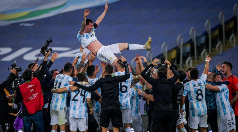 Lionel Messi is lifted by his Argentina teammates at the end of the Copa America final on 11 July 2021