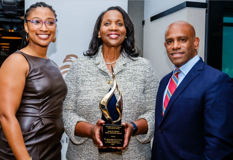 Lisa Cook (middle), while receiving Joint Center Louis E. Martin Great American Award