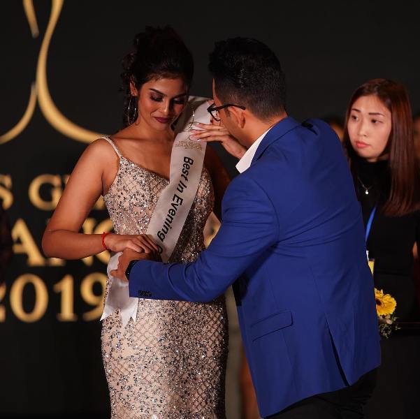 Lishalliny Kanaran, while receiving the Miss Best in Evening Gown sash at the Miss Grand Selangor 2019