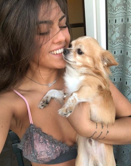 Livia Brunga with her pet dog