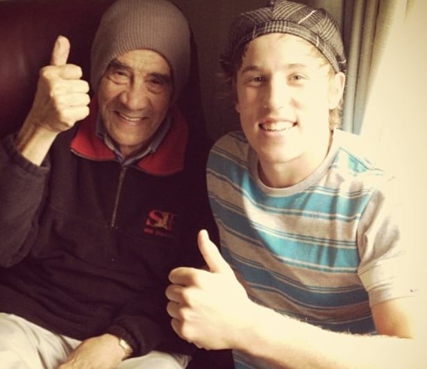 Logan van Beek posing with his grandfather who died in 2013