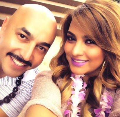 Lupillo Rivera and Mayeli Alonso (right)
