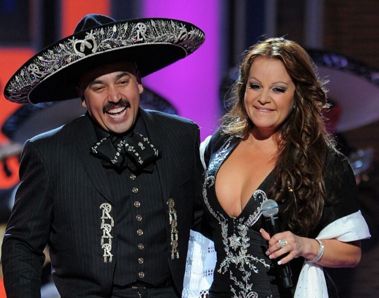 Lupillo Rivera with his sister, Jenni Rivera, during a show
