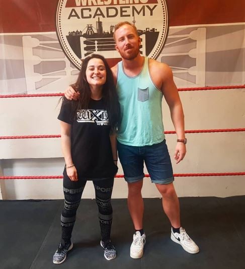 Lyra Valkyria (left) when she was fighting in the Westside Xtreme Wrestling (wXw)