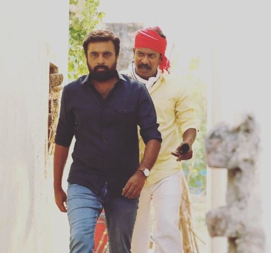 M. Sasikumar as Jeeva in the Tamil film Naadodigal 2