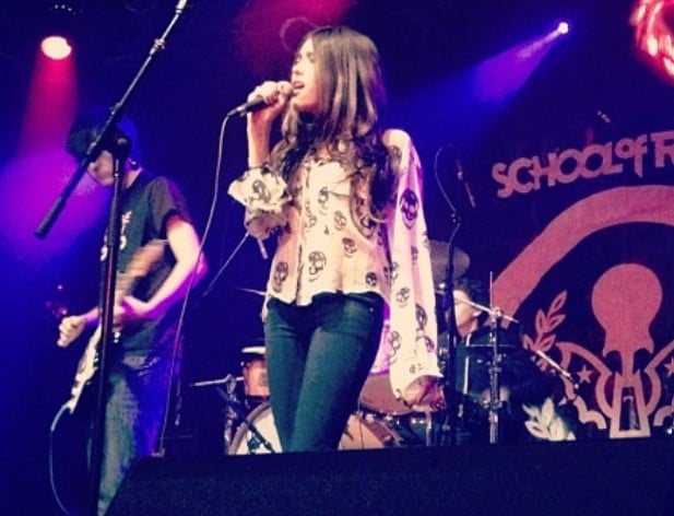 Madison Beer while singing live in 2012