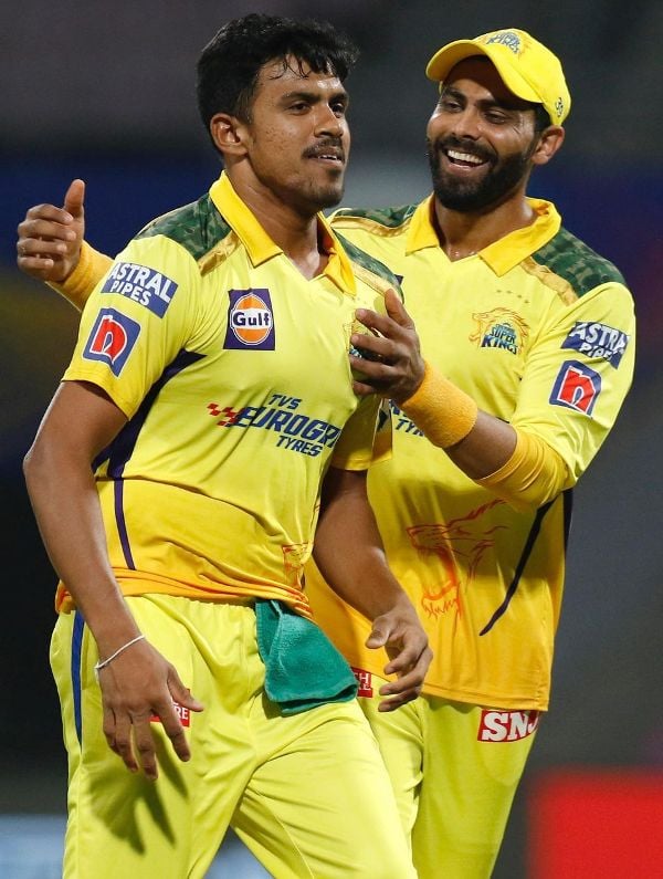 Maheesh Theekshana with Ravindra Jadeja (left) during an IPL match