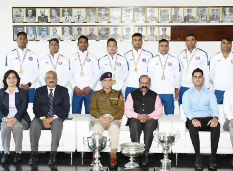 Mahendra Choudhary posing with his team after winning the 71st All India Police Kabaddi Championship
