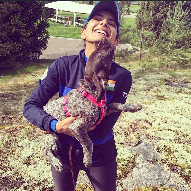 Maheshwari holding a dog