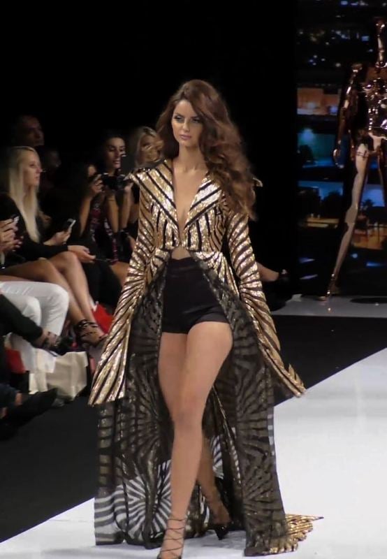 Mahlagha Jaberi while walking the ramp at an event for Michael Costello