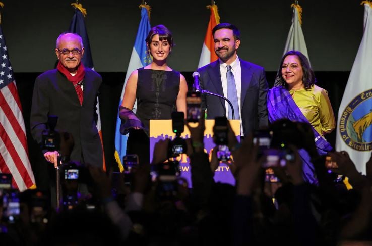 Mahmood Mamdani (left) with his family, when his son was elected as the Mayor of New York City
