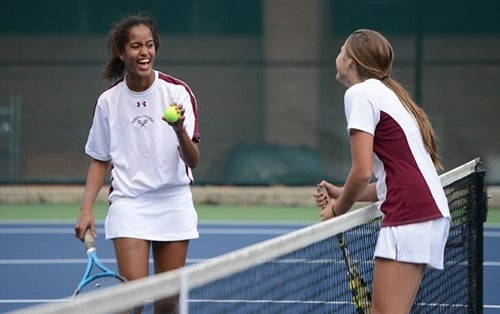 Malia Obama playing tennis with her friend in school
