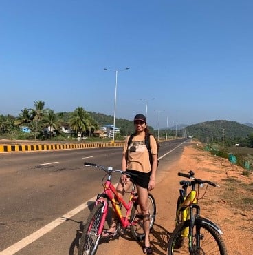 Mallika Rajput while riding a bicycle