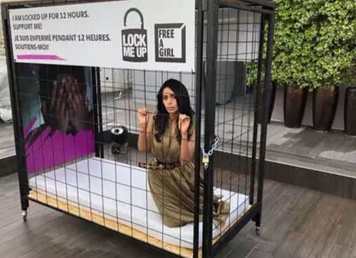 Mallika Sherawat locked in a cage in support of an NGO campaign