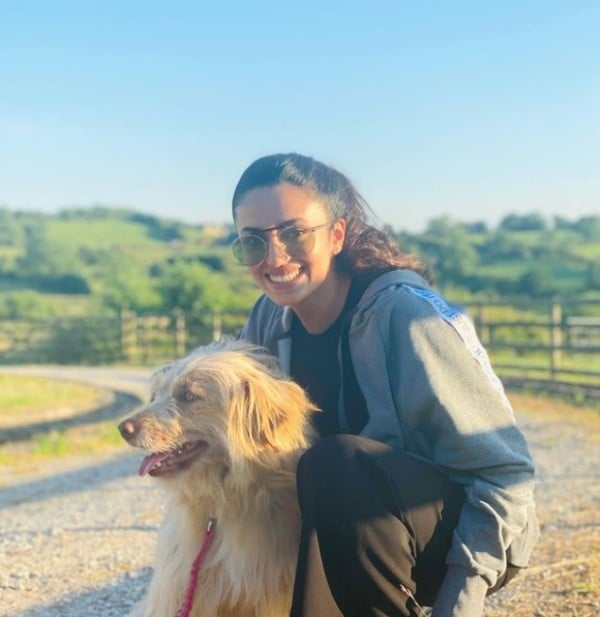 Malvika Nair with a dog