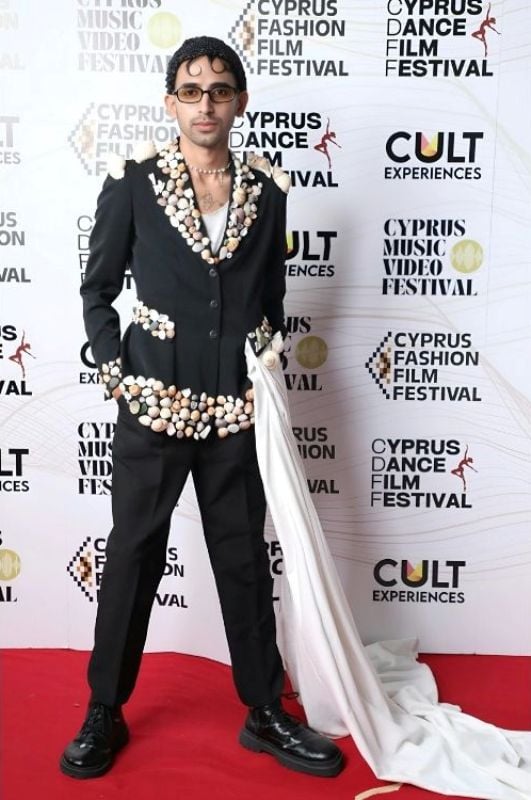 Mancheet Hooda at the 2025 Cyprus Fashion Film Festival, wearing a goddess-inspired look decorated with seashells collected from Aphrodite Beach