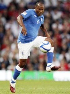 Manchester United guest player Brian Lara tries a shot on goal