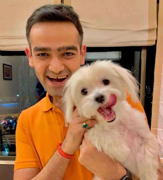 Mangalam Maloo with his pet dog
