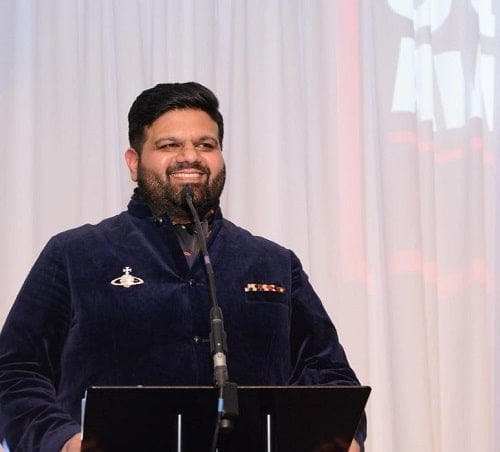Mani Liaqat hosting an event