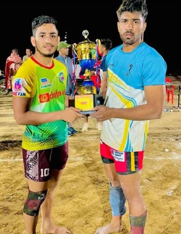Manish Dhull (left) at a local Kabaddi tournament in Jind, Haryana