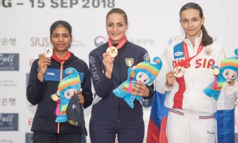 Manisha Keer (extremely left) posing with her medal at the ISSF Shooting World Championship in South Korea