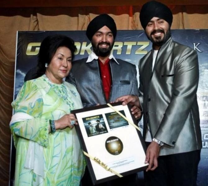 Manjit Singh Gill and Sukhjit Singh Gill with Rosmah Mansor at the launch of 