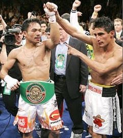 Manny Pacquiao during the fight against Erik Morales (right)