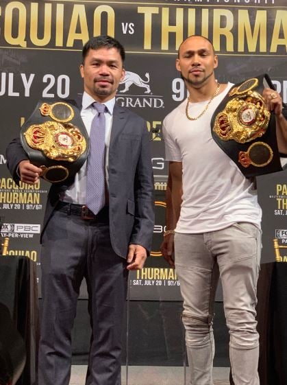 Manny Pacquiao with Keith Thurman (right) during promotion of their fight