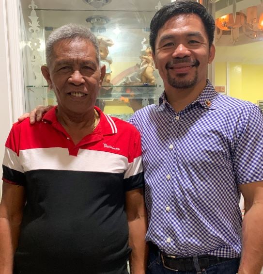 Manny Pacquiao with his father (left)
