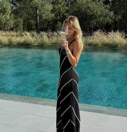 Margarida Corceiro while enjoying wine