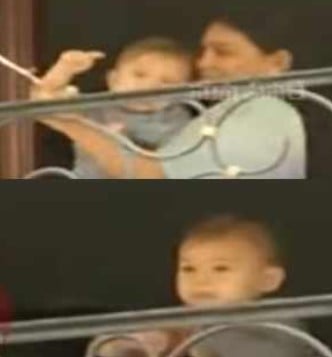 Mark Shankar Pawanovich while waving from his house