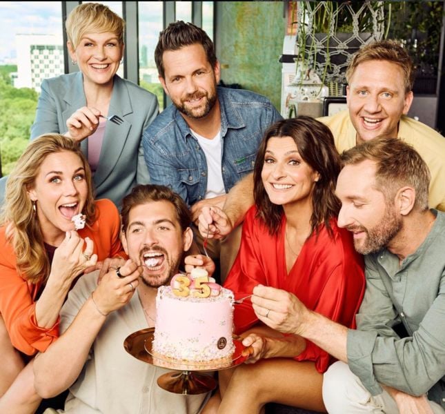 Marlene Lufen (wearing red) with the entire star cast of the German talk show titled 