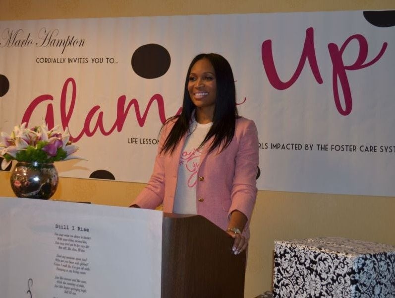 Marlo Hampton speaking at an event for 