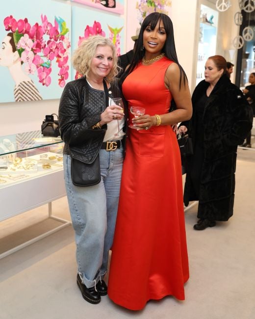 Marlo Hampton with a glass of alcohol