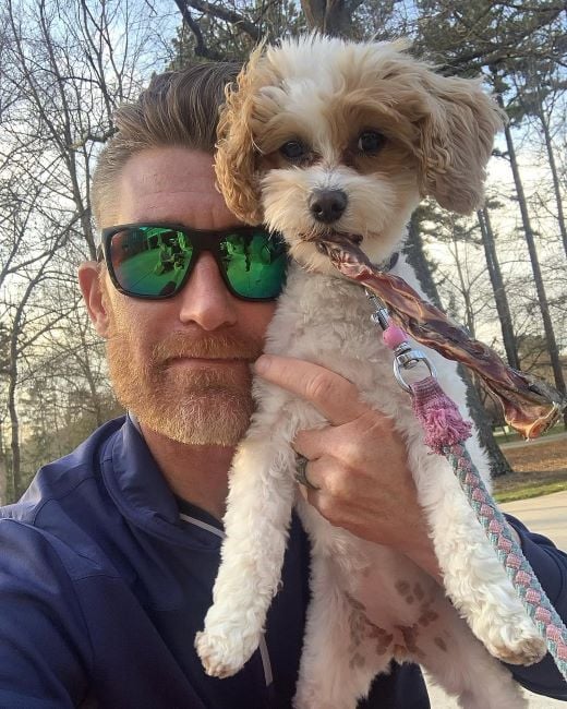 Marty Smith with his Cavapoo