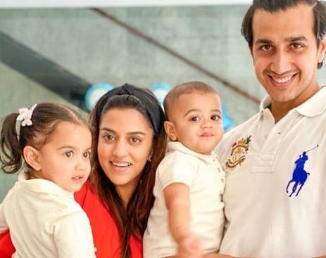 Marushka with her family