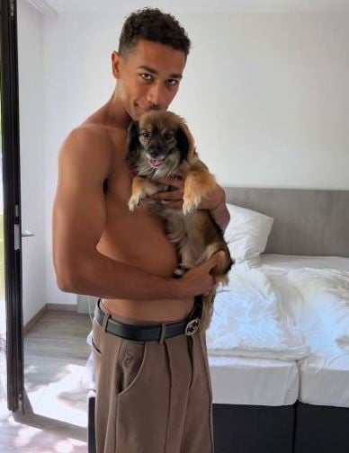 Marvin Opana with his pet dog