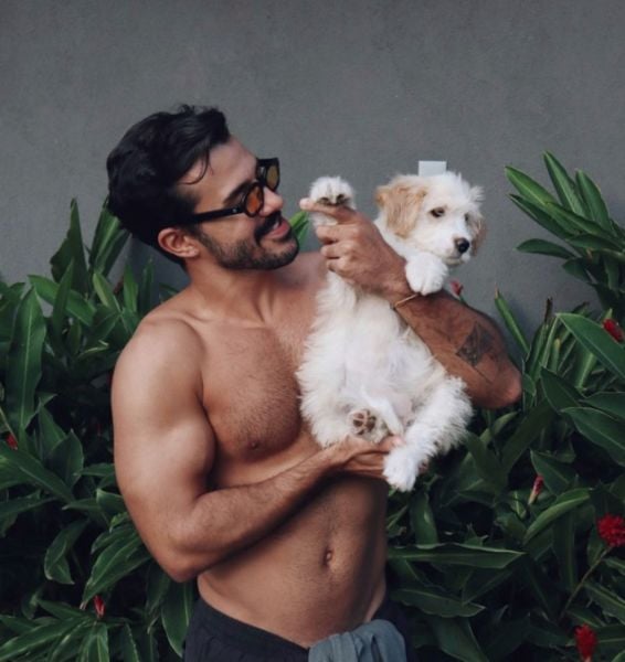 Mateus Pires with his pet dog