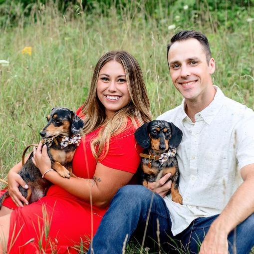 Matt Moeller and Alaina Scott with their pet dogs