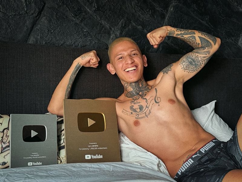 Mauricio Gómez with his Golden and Silver Play Buttons