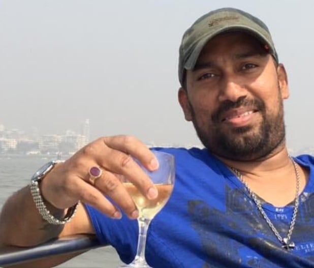 Mauris Noronha drinking wine