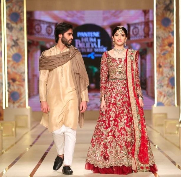 Mawra Hocane while walking the ramp as a showstopper along with Ameer Gilani at the 2021 Bridal Couture Week for Tabya