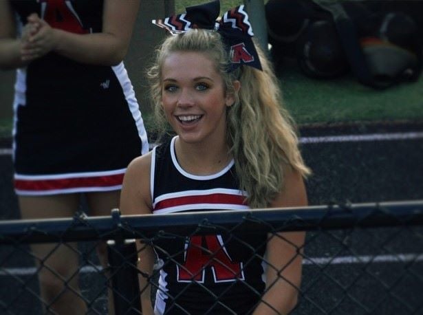 Megan Moroney as a cheerleader