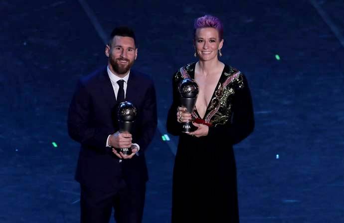Megan Rapinoe with Lionel Messi
