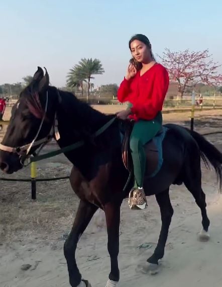 Meghna Alam riding a horse
