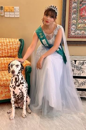 Meghna Alam with a Dalmatian dog