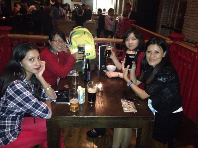 Meghna Alam with a glass of alcohol