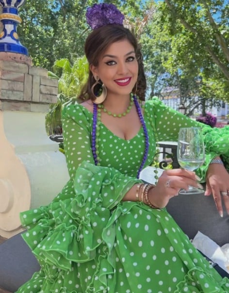 Meghna Lakhani while enjoying an alcoholic beverage